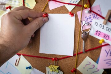 A chaotic clue board with post-it notes and strings connecting everything—kind of like trying to figure out where your QuickBooks balance went.